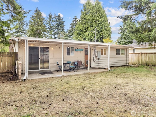 10818 108th St SW, Lakewood, WA 98498 - rear view of property featuring a patio and a fenced backyard
