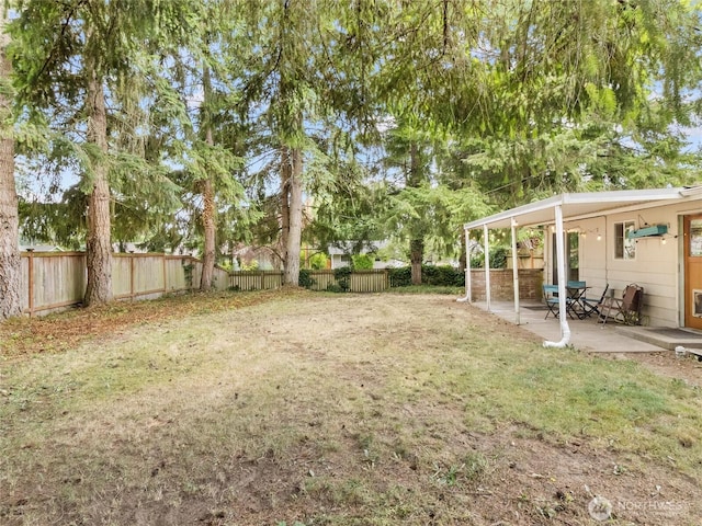 10818 108th St SW, Lakewood, WA 98498 - fenced backyard featuring a patio area