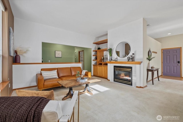 2420 Forest Ridge Dr SE, Auburn, WA 98002 - living area with a fireplace and light carpet