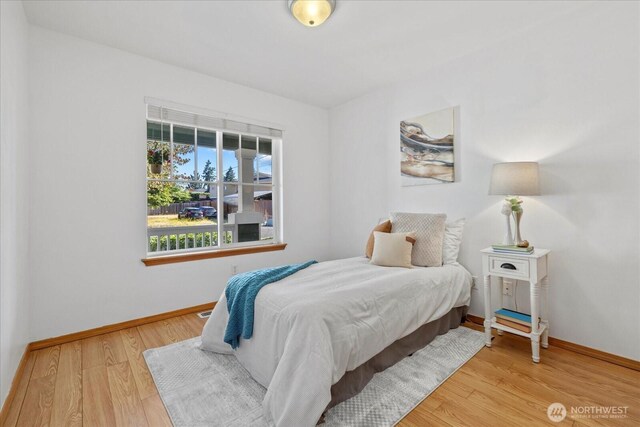 2420 Forest Ridge Dr SE, Auburn, WA 98002 - bedroom with wood finished floors and baseboards