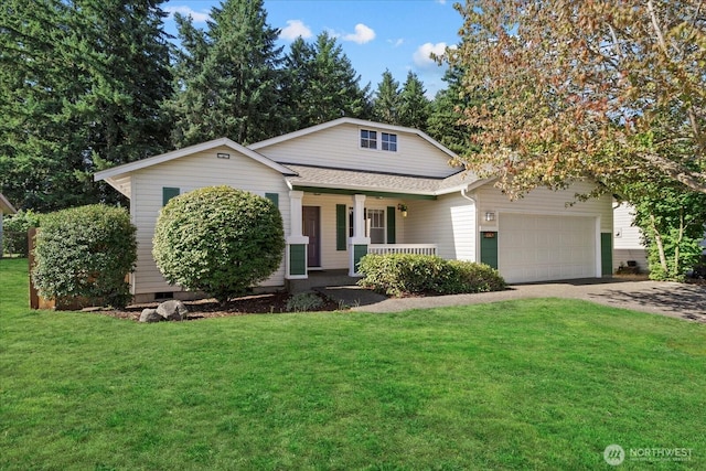 2420 Forest Ridge Dr SE, Auburn, WA 98002 - view of front of house with covered porch, an attached garage, a front yard, driveway, and roof with shingles