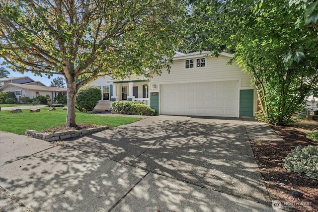 2420 Forest Ridge Dr SE, Auburn, WA 98002 - view of property hidden behind natural elements with driveway, a front yard, and an attached garage