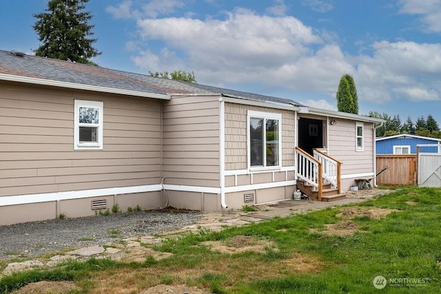 3800 Sleater Kinny Rd NE Unit 13, Olympia, WA 98506 - rear view of property with entry steps, crawl space, and roof with shingles