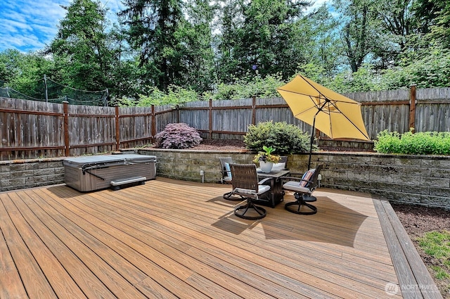 3606 Tree Farm Ct, Bellingham, WA 98226 - wooden deck with outdoor dining area, a fenced backyard, and a hot tub