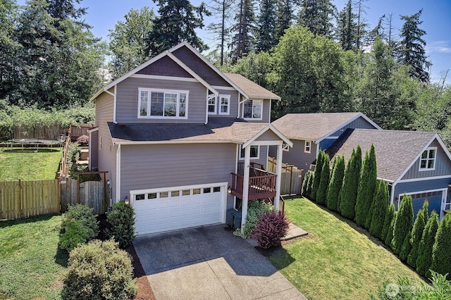3606 Tree Farm Ct, Bellingham, WA 98226 - view of front of house with a garage, concrete driveway, a trampoline, and a deck