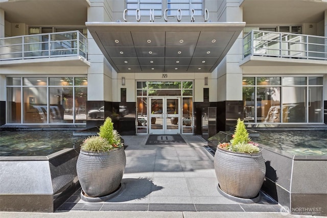 2929 1st Ave Unit 721, Seattle, WA 98121 - back of house featuring french doors and a balcony