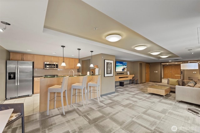 2929 1st Ave Unit 721, Seattle, WA 98121 - living area featuring a raised ceiling, light carpet, and recessed lighting