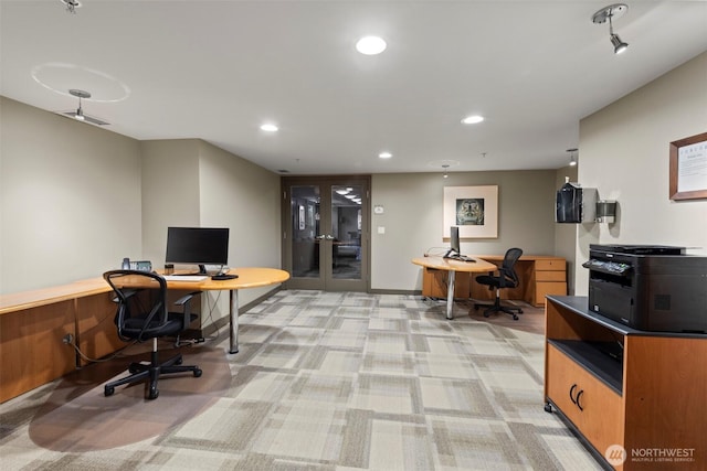 2929 1st Ave Unit 721, Seattle, WA 98121 - home office with french doors, light colored carpet, and recessed lighting