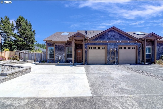 126 28th St NW, Long Beach, WA 98631 - ranch-style home with a garage, concrete driveway, and roof with shingles