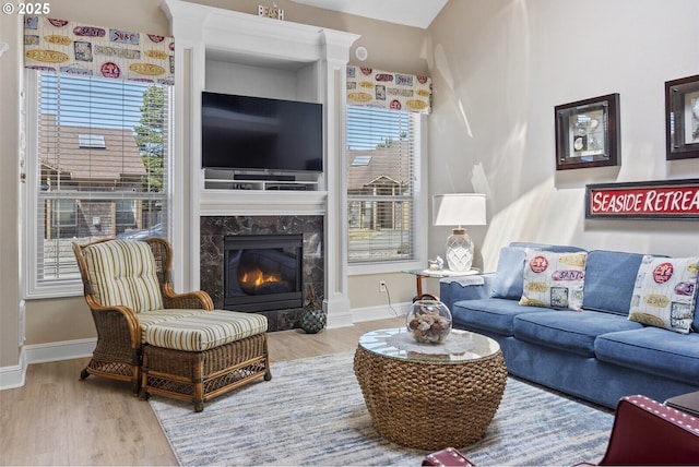 126 28th St NW, Long Beach, WA 98631 - living room with wood finished floors and a high end fireplace