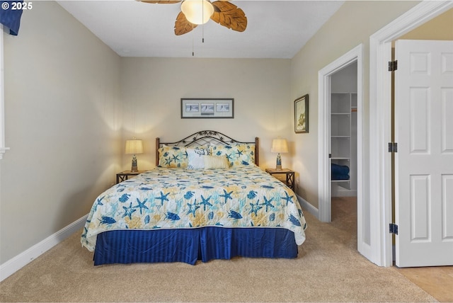 126 28th St NW, Long Beach, WA 98631 - bedroom with carpet floors, a spacious closet, and ceiling fan