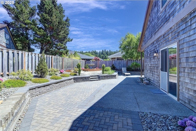 126 28th St NW, Long Beach, WA 98631 - fenced backyard with a patio area