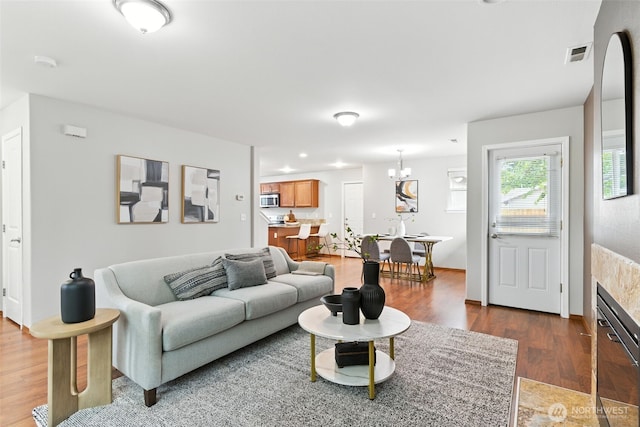 7436 S G St, Tacoma, WA 98408 - living room featuring wood finished floors