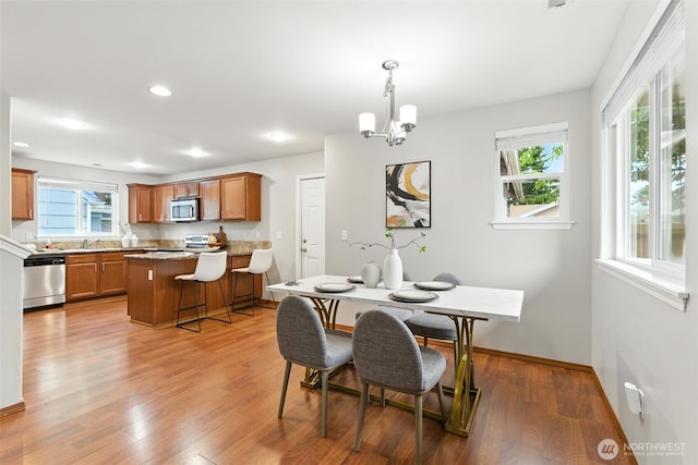 7436 S G St, Tacoma, WA 98408 - dining room featuring a chandelier, light wood-style flooring, and recessed lighting