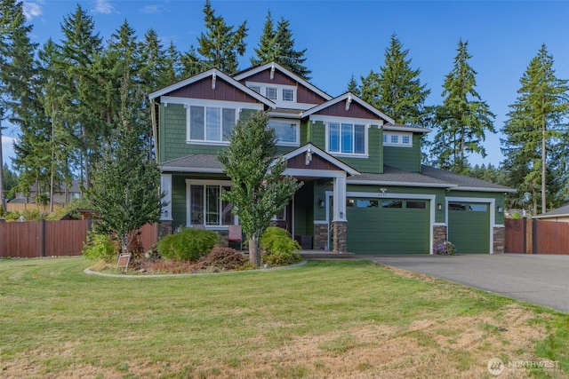 4831 Skylark St NE, Olympia, WA 98516 - craftsman inspired home featuring driveway, stone siding, and a garage
