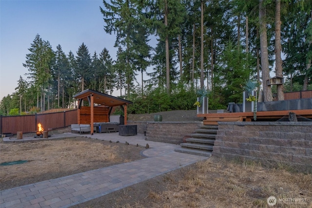 4831 Skylark St NE, Olympia, WA 98516 - view of yard featuring a patio, a gazebo, and an outdoor living space with a fire pit