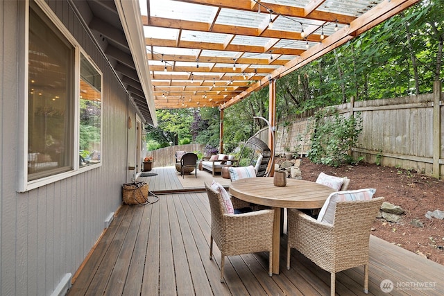 25920 202nd Ave SE, Covington, WA 98042 - wooden terrace featuring outdoor dining area, a fenced backyard, and a pergola