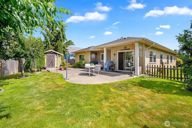1918 Tundra Loop, Mount Vernon, WA 98273 - back of property with a shed, a patio, and a fenced backyard