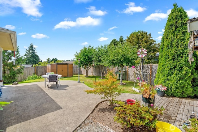 1918 Tundra Loop, Mount Vernon, WA 98273 - fenced backyard featuring a shed, a patio area, a wooden deck, and outdoor dining space