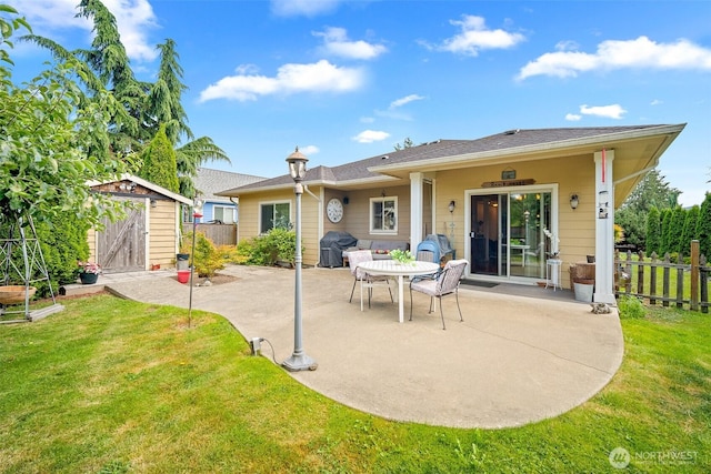 1918 Tundra Loop, Mount Vernon, WA 98273 - rear view of property with a patio area and a storage unit