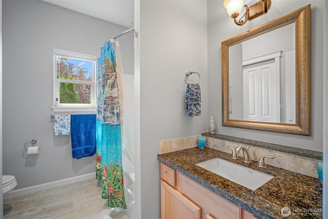 1918 Tundra Loop, Mount Vernon, WA 98273 - full bathroom with vanity, curtained shower, and wood finished floors