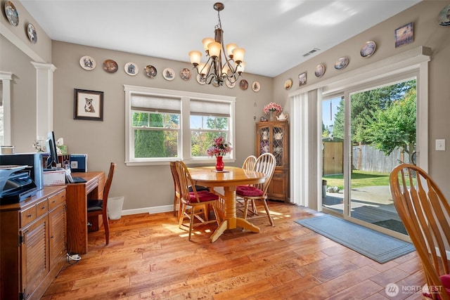 1918 Tundra Loop, Mount Vernon, WA 98273 - dining room featuring light wood-style floors, plenty of natural light, and a chandelier