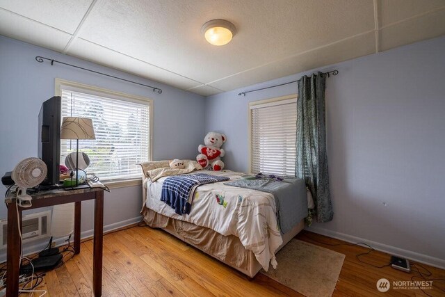 1427 E 3rd St, Port Angeles, WA 98362 - bedroom with baseboards and light wood-style floors