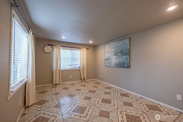 1427 E 3rd St, Port Angeles, WA 98362 - spare room with light tile patterned floors and recessed lighting