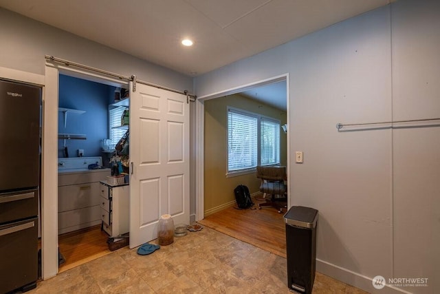 1427 E 3rd St, Port Angeles, WA 98362 - hallway with a barn door and recessed lighting