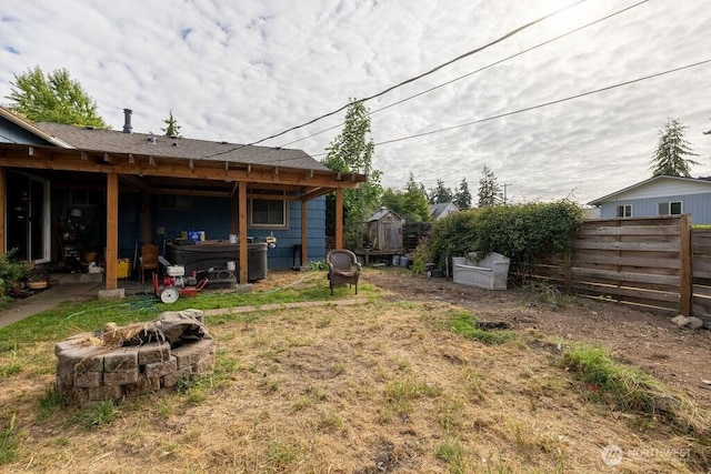 1427 E 3rd St, Port Angeles, WA 98362 - view of yard with a fire pit