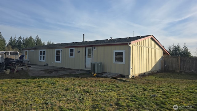 134 St Lawrence Dr, Onalaska, WA 98570 - back of property with a patio area and board and batten siding