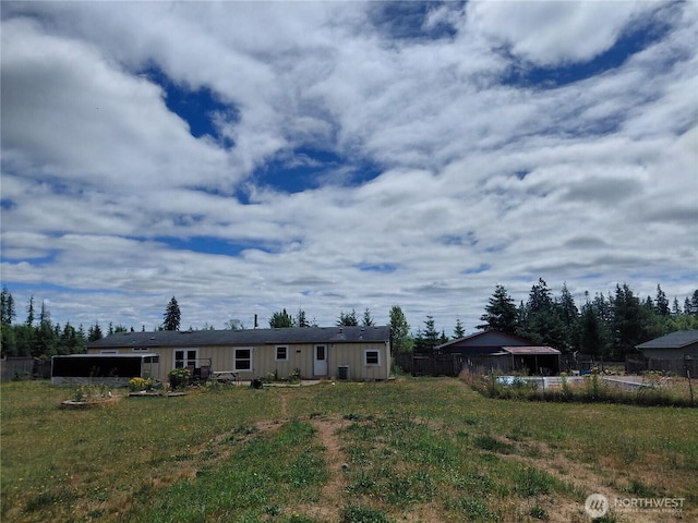134 St Lawrence Dr, Onalaska, WA 98570 - rear view of house with board and batten siding