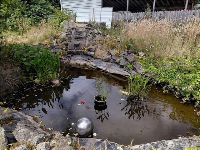 134 St Lawrence Dr, Onalaska, WA 98570 - water view with a small pond