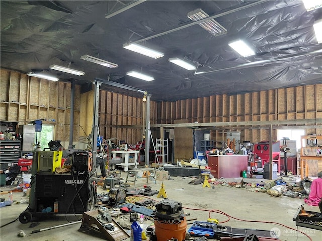 134 St Lawrence Dr, Onalaska, WA 98570 - garage featuring a workshop area