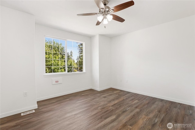 2711 SE 10th St Unit 1099, Renton, WA 98058 - unfurnished room with dark wood-style flooring and ceiling fan