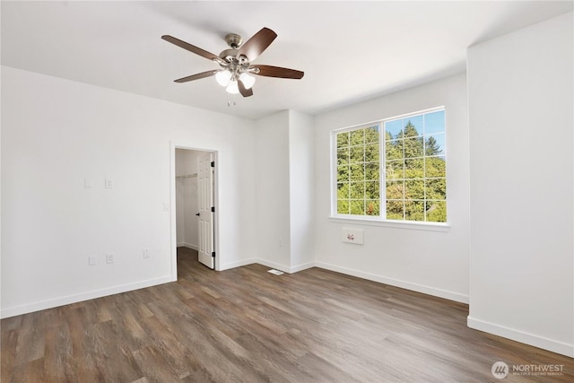 2711 SE 10th St Unit 1099, Renton, WA 98058 - unfurnished room featuring wood finished floors and ceiling fan