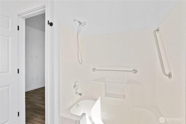 2711 SE 10th St Unit 1099, Renton, WA 98058 - bathroom with bathtub / shower combination and wood finished floors