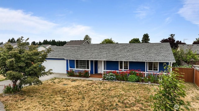 16228 Curry Ct SE, Yelm, WA 98597 - ranch-style house featuring a porch, an attached garage, concrete driveway, and a shingled roof