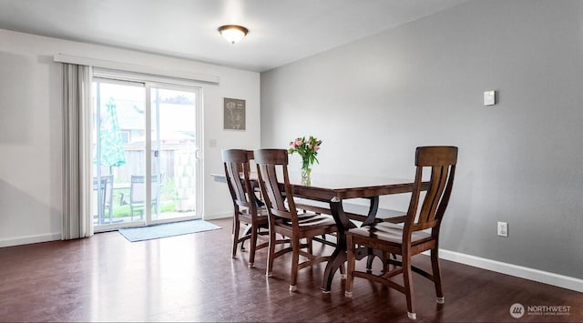 16228 Curry Ct SE, Yelm, WA 98597 - dining space featuring dark wood-style flooring and baseboards