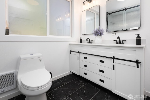 4020 N 34th St, Tacoma, WA 98407 - bathroom featuring marble finish flooring, double vanity, and heating unit