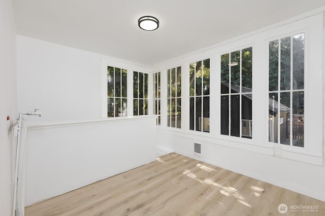 4020 N 34th St, Tacoma, WA 98407 - unfurnished sunroom featuring wood finished floors and a wooden deck