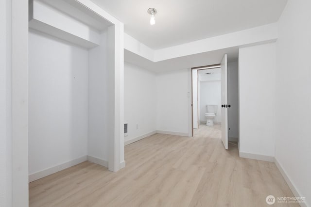 4020 N 34th St, Tacoma, WA 98407 - unfurnished bedroom featuring wood finished floors and baseboards