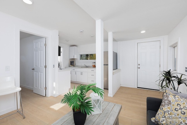 4020 N 34th St, Tacoma, WA 98407 - living room featuring light wood finished floors and recessed lighting