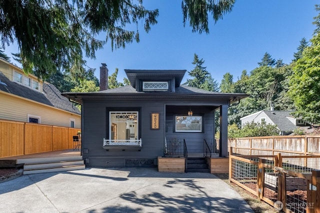 4020 N 34th St, Tacoma, WA 98407 - view of front facade featuring a chimney
