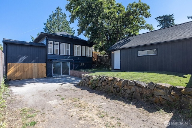 4020 N 34th St, Tacoma, WA 98407 - back of house featuring a shingled roof and driveway