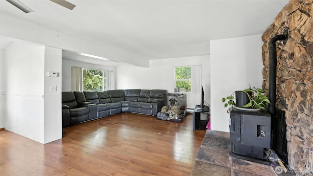32626 46th Pl S, Auburn, WA 98001 - living area featuring a wood stove, hardwood / wood-style flooring, healthy amount of natural light, and a baseboard heating unit