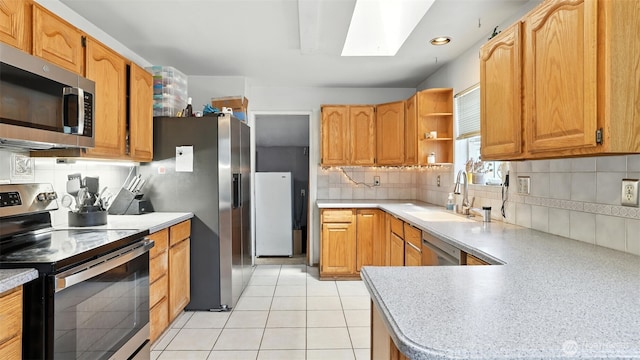 32626 46th Pl S, Auburn, WA 98001 - kitchen featuring stainless steel appliances, a skylight, backsplash, open shelves, and light countertops
