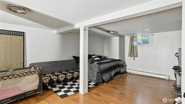 32626 46th Pl S, Auburn, WA 98001 - bedroom with baseboard heating and hardwood / wood-style floors