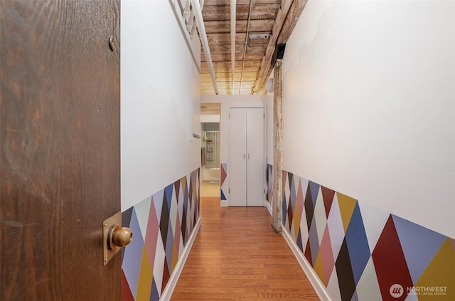 1507 Western Ave Unit R203, Seattle, WA 98101 - hallway with wood finished floors and beamed ceiling