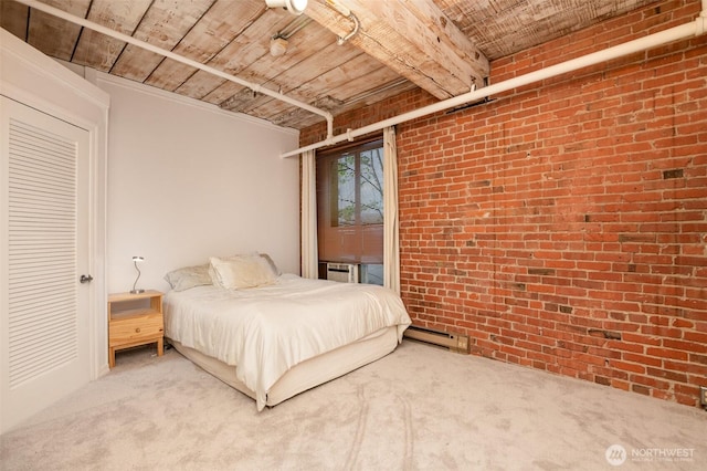 1507 Western Ave Unit R203, Seattle, WA 98101 - bedroom with brick wall, carpet flooring, a baseboard heating unit, and wooden ceiling